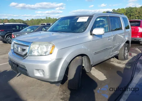 2011 Honda Pilot Touring z USA, uszkodzony, nr VIN 5FNYF4H97BB096791